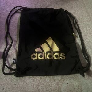 Adidas Black and Gold Logo Drawstring Backpack
